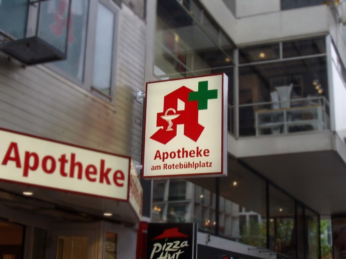 Apotheke am Rotebühlplatz · Profil 4d — doppelseitiger Ausleger